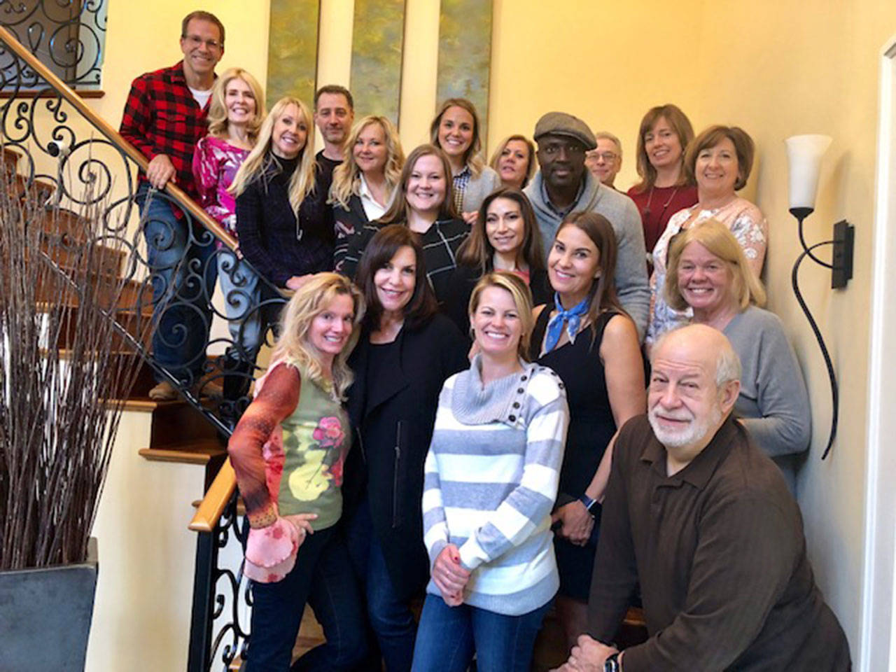 Barbie Young (third from the left) poses in a group shot with the Kirkland Downtown Association Board of Directors. Photo courtesy of Barbie Young