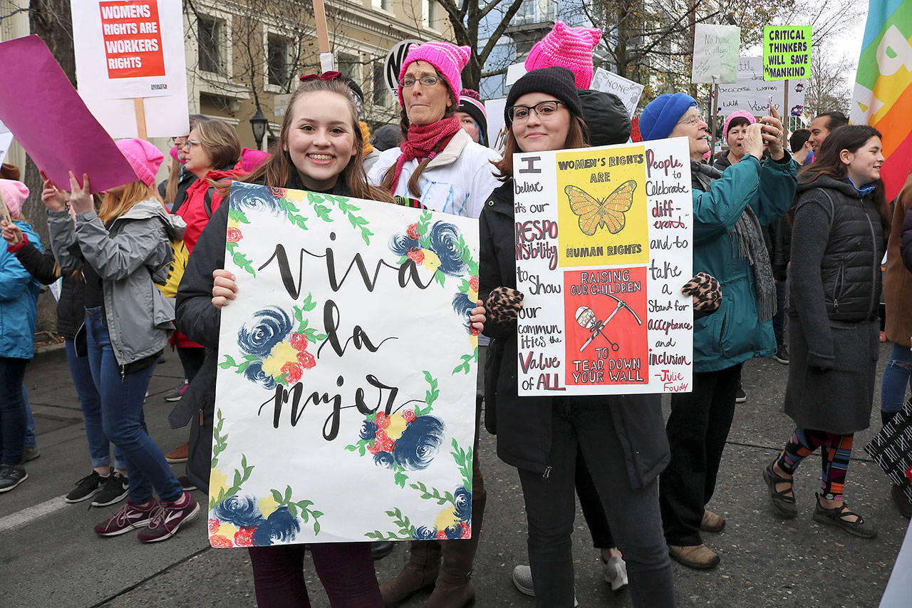 Seattle Pacific University students Delaney Palmer and Bridgett Palmer attended the Womxn’s March on Jan. 19 for the second time. They said it’s important to fight back. Stephanie Quiroz/staff photo.