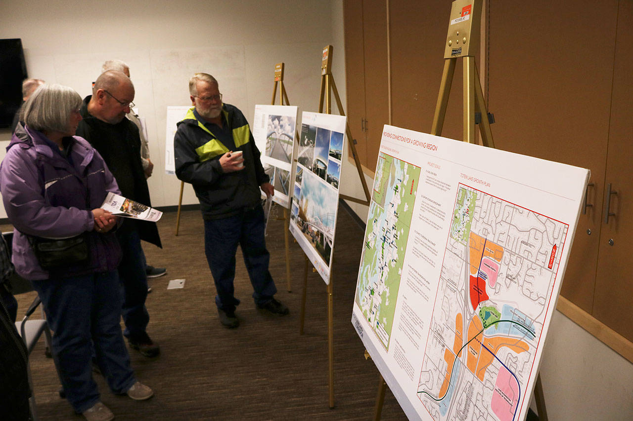 Kirkland residents discuss and review designs for a city project with city staff and contracted engineers at an open house in 2018 at the Kirkland Justice Center. The 124th project will host a similar open house on Feb. 12. Kailan Manandic/staff photo