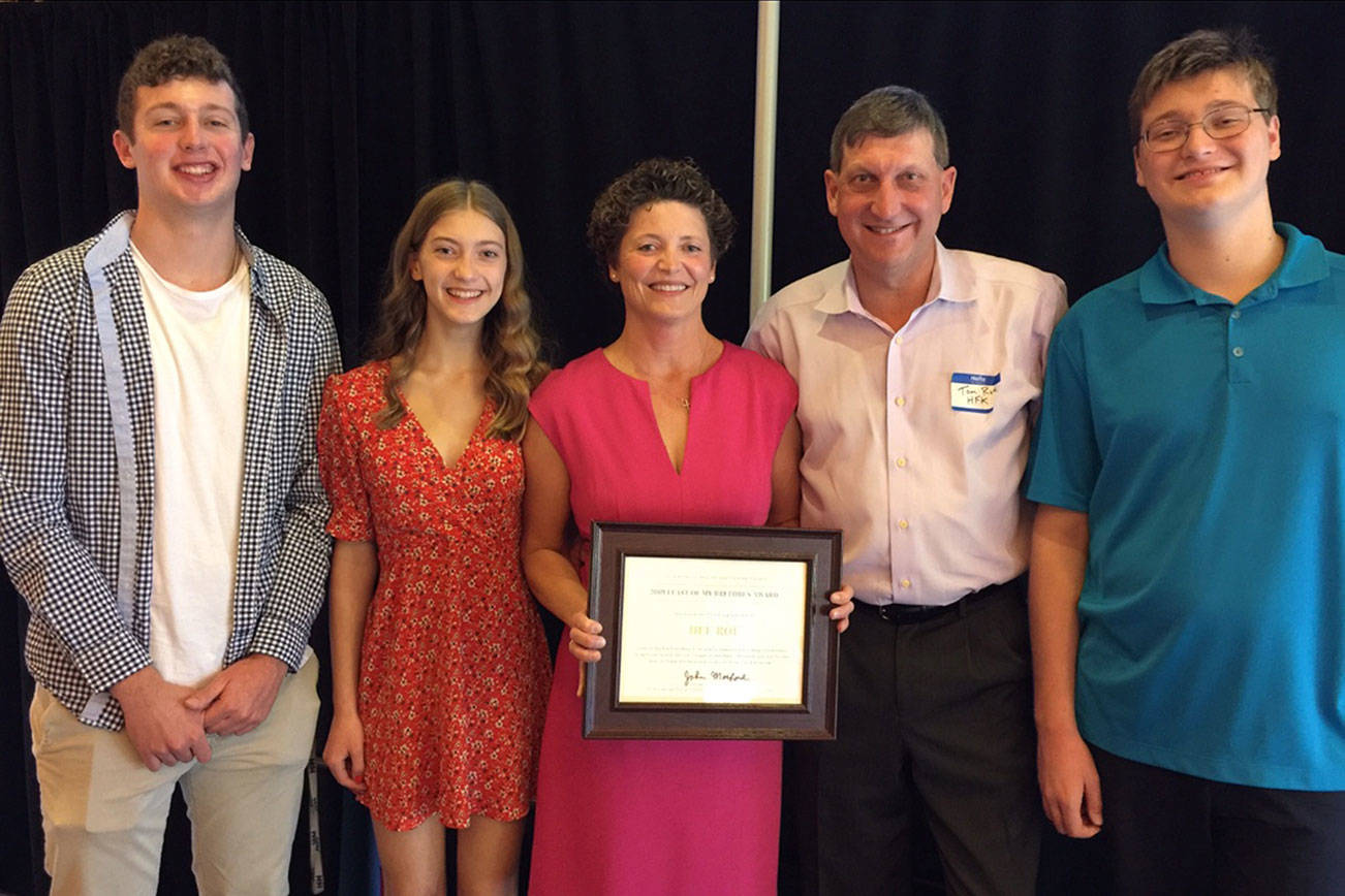 From left: Philip, Mary Madaline, Dee, Tom and Thomas Roe pose together at the award ceremony. Photo courtesy of St. Vincent de Paul