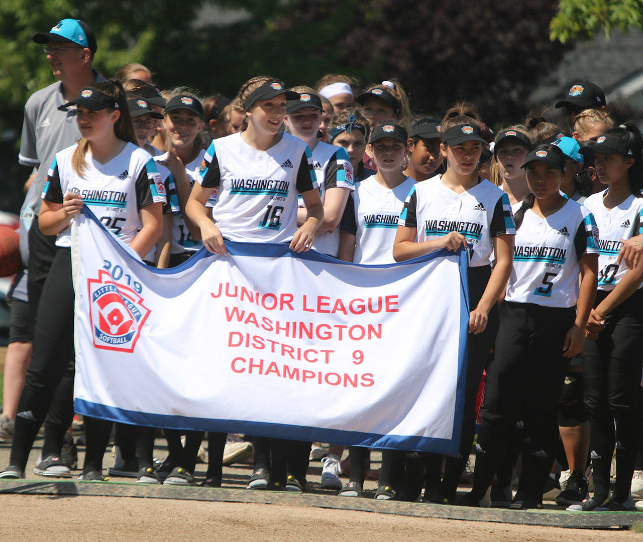 The Eastlake Little League host squad from Sammamish enters the field at the start of the opening ceremony on July 28. Andy Nystrom/ staff photo