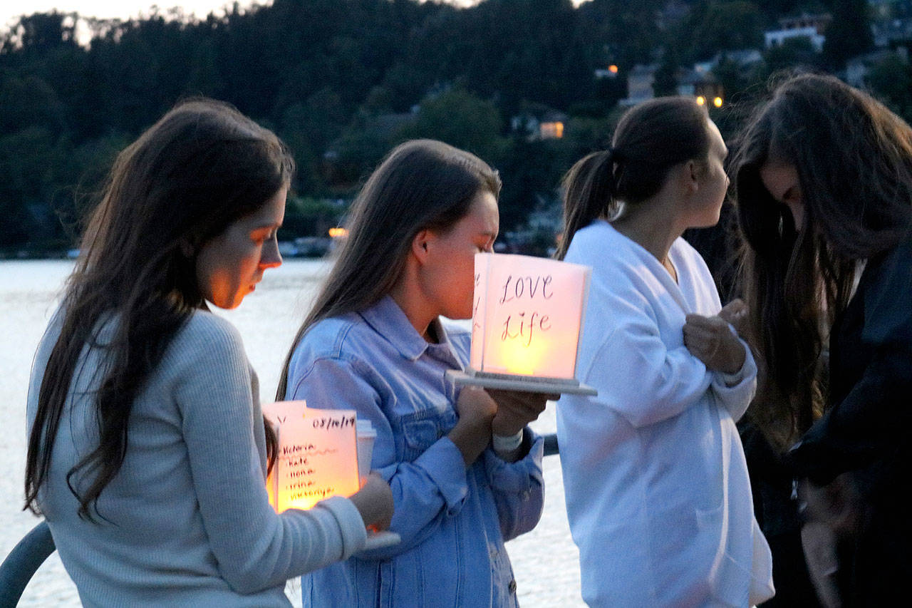 Stephanie Quiroz/staff photo                                 Festival attendees wrote positive and hopeful messages like “Love Life” on their lanterns.