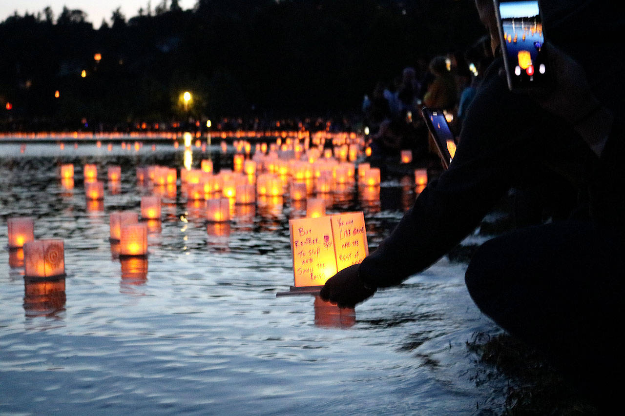 Hundreds of water lanterns filled Juanita Bay on Aug. 10. Stephanie Quiroz/staff photo