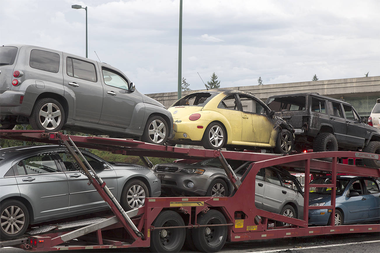 Used car on back of truck catches fire near I-405 on-ramp in Kirkland