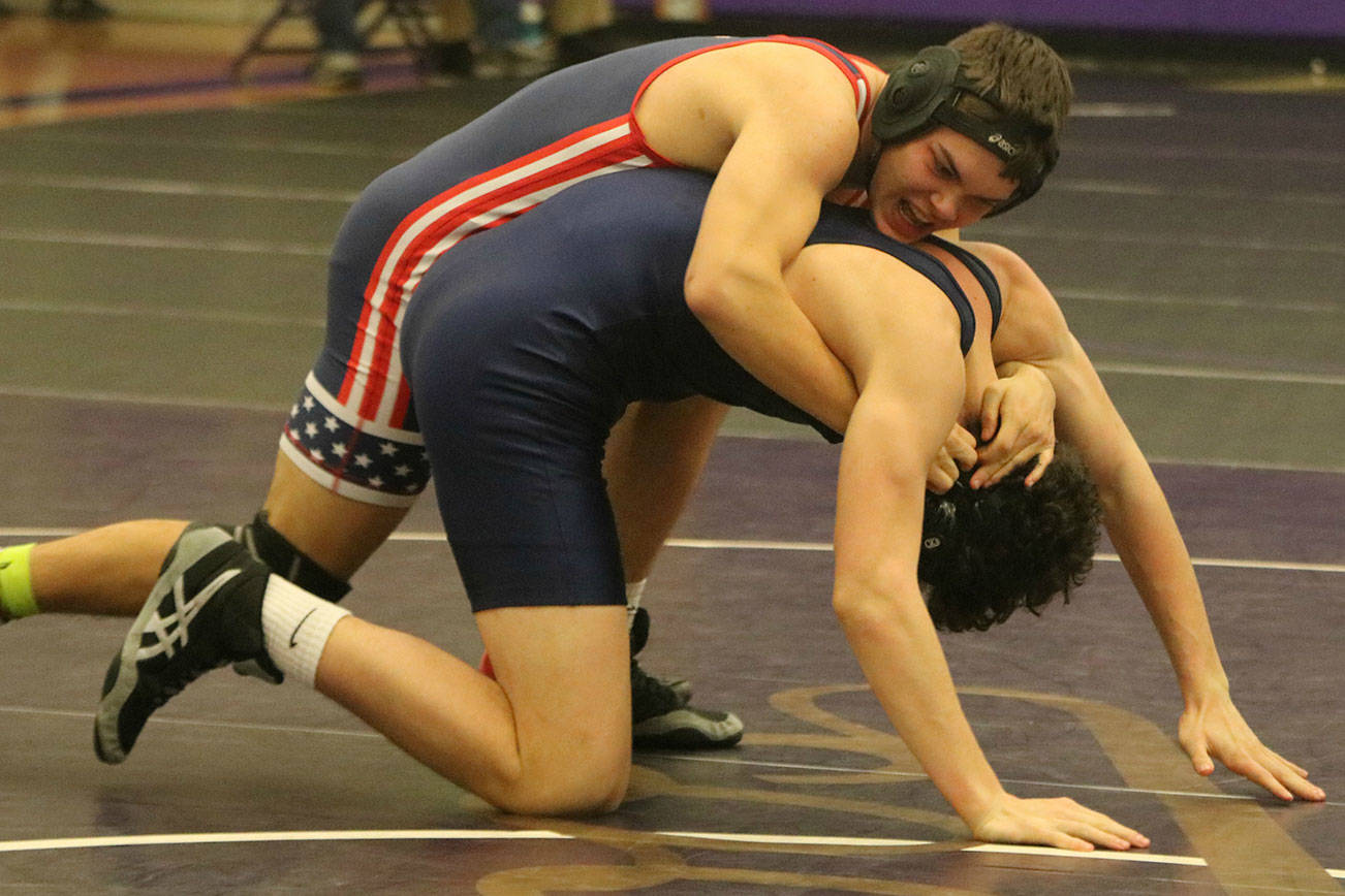 Juanita and Lake Washington wrestlers are unleashed on the mat