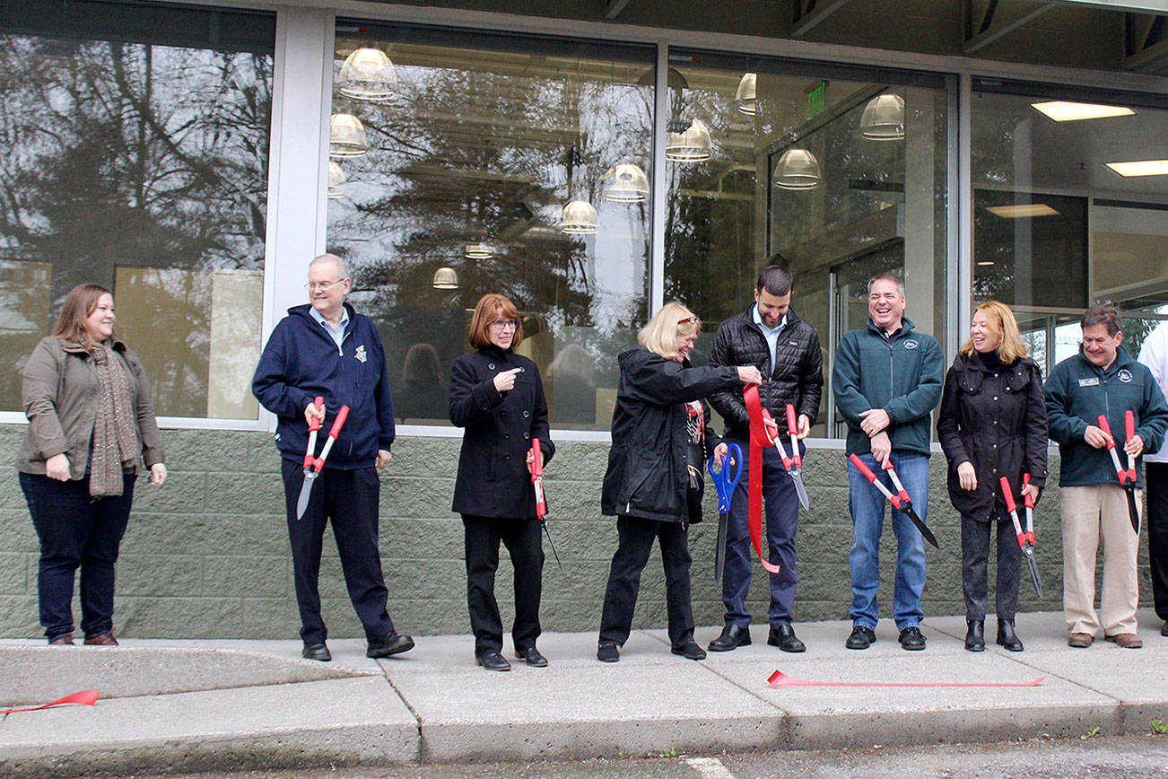 Blake Peterson/staff photo                                City staff cut the ribbon in front of the facility.