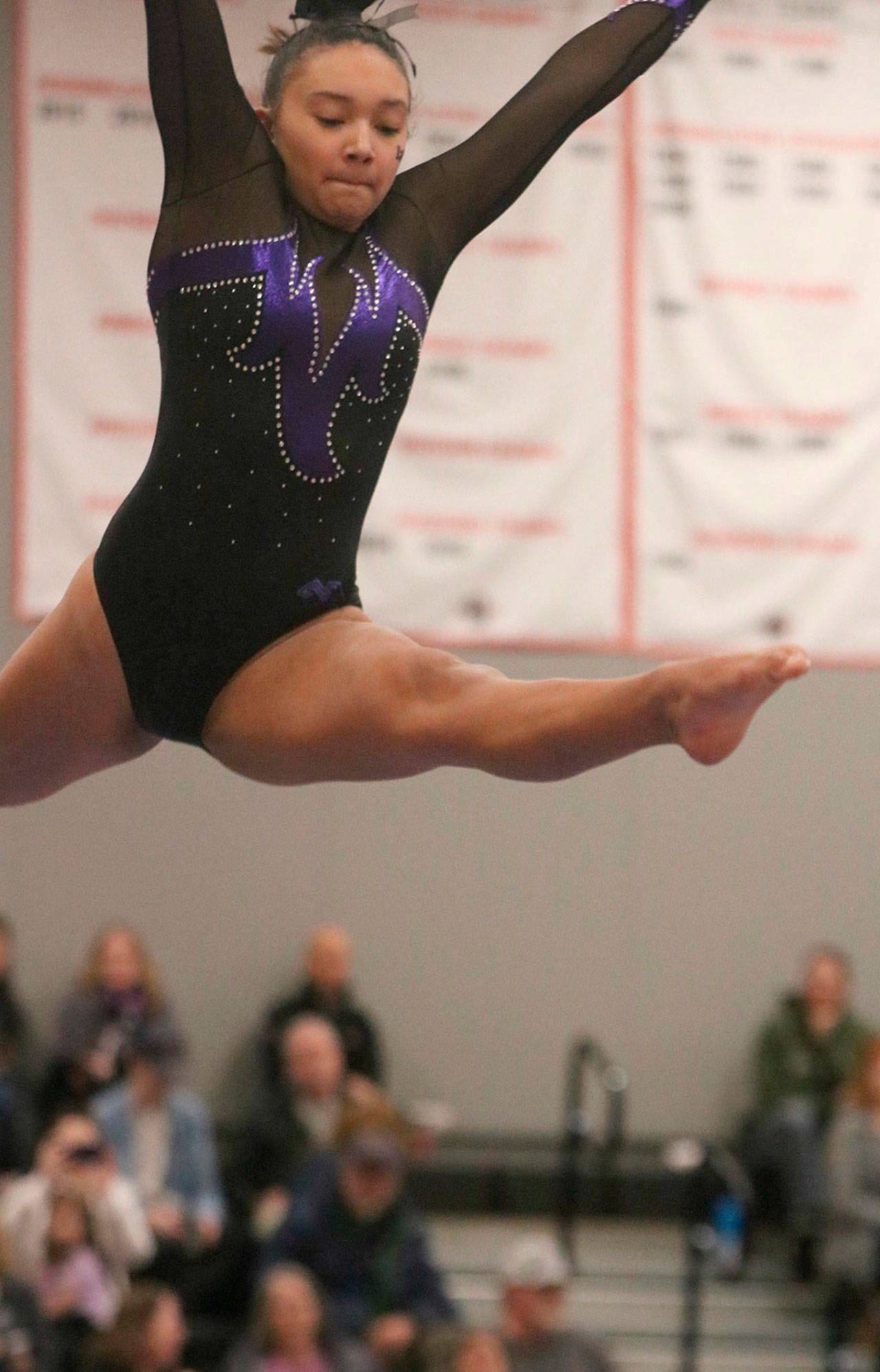 Lake Washington’s Laly Noriega gets some air time on beam at last season’s state meet. Andy Nystrom / staff photo
