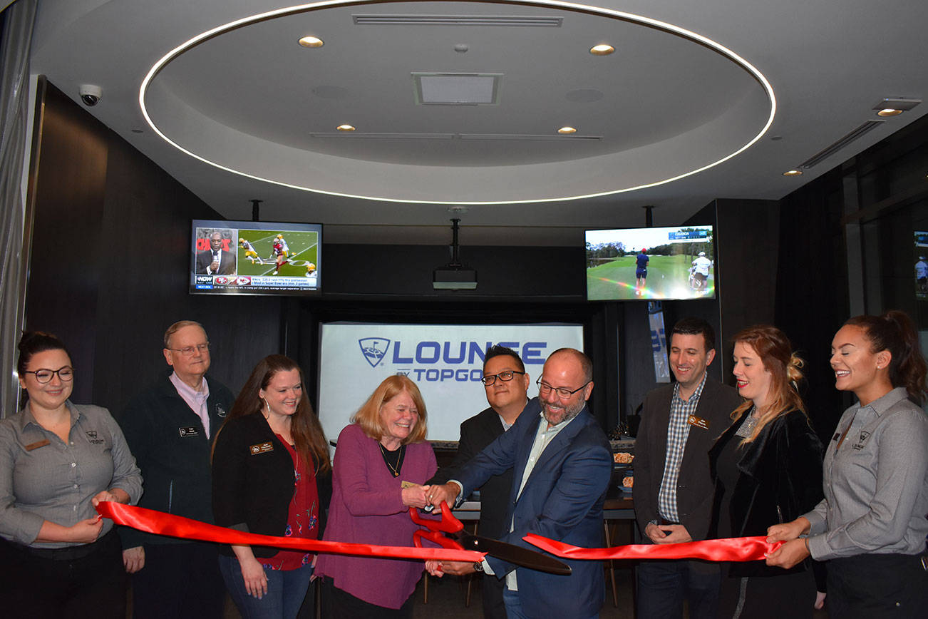 Lounge by Topgolf, which features Full Swing golf simulator technology along with an innovative bar and restaurant concept, held its grand-opening ceremony on Jan. 24 in Kirkland at 425 Urban Plaza, Suite 200. From left to right: Sarah Rutledge (Lounge by Topgolf associate), Toby Nixon (Kirkland City Councilmember), Amy Falcone (Kirkland City Councilmember), Kirkland Mayor Penny Sweet, Hun Kim (general manager at Lounge by Topgolf), Ron Powers (president of Topgolf Swing Suites), Jon Pascal (Kirkland City Councilmember), Alyssa Jones (assistant general manager at Lounge by Topgolf) and Salena Cordell (Lounge by Topgolf associate). Photo courtesy of Bailie Pelletier