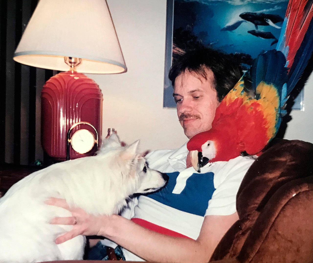 John Fleshman, Denny’s Pet World owner, with Tiki at his home. Photo courtesy of Julia Marshall