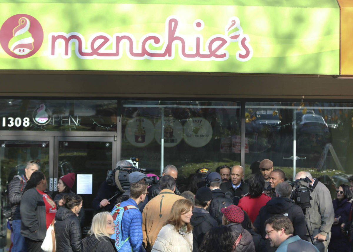 People protest at Totem Lake Menchie’s on Nov. 20, 2018, regarding a black man being asked to leave the store earlier that month. File photo