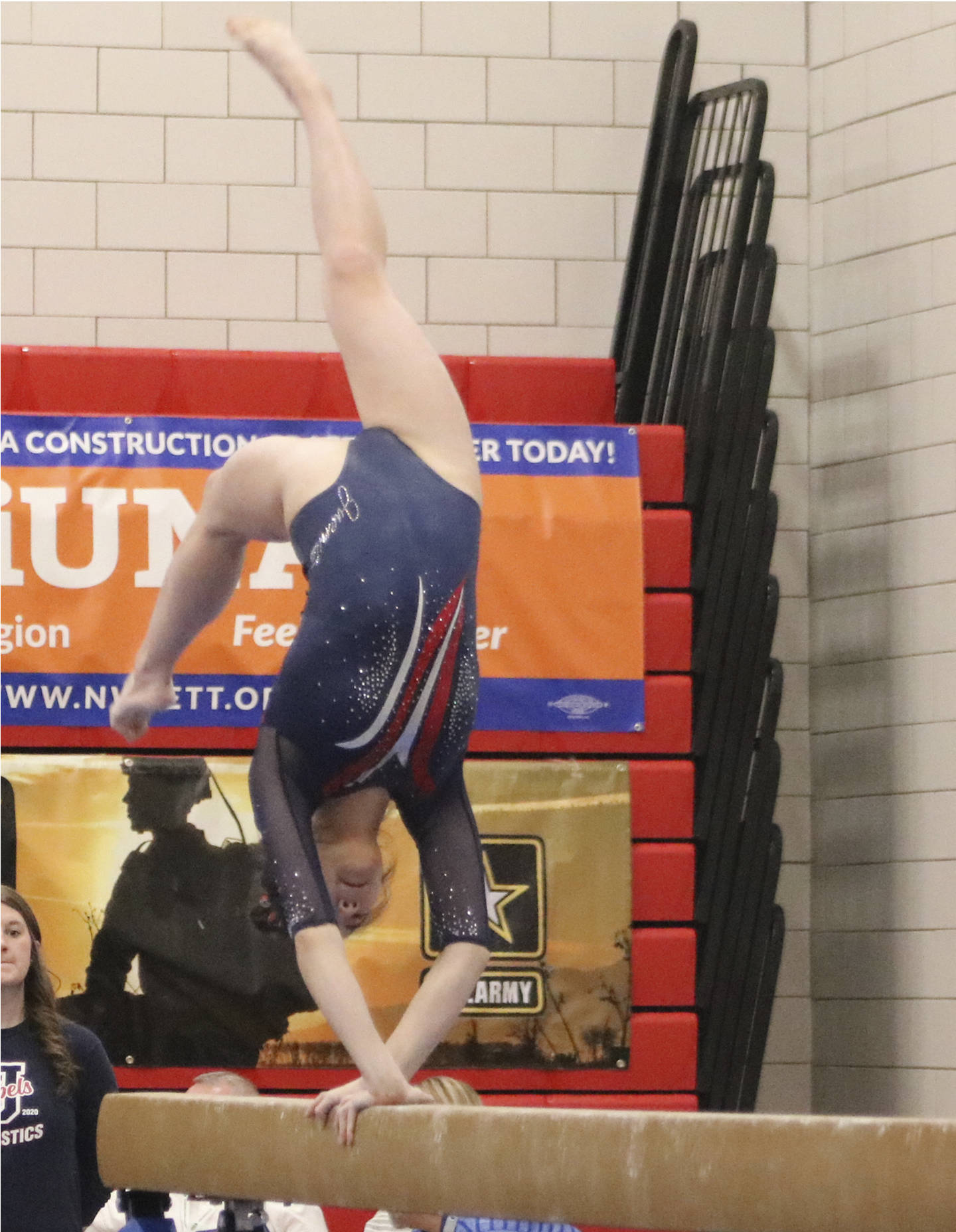 Juanita gymnast Daphanie Chan competes on the beam during the first day of competition at the 1A/2A/3A state gymnastics meet on Feb. 20 at Sammamish High School. Benjamin Olson/staff photo