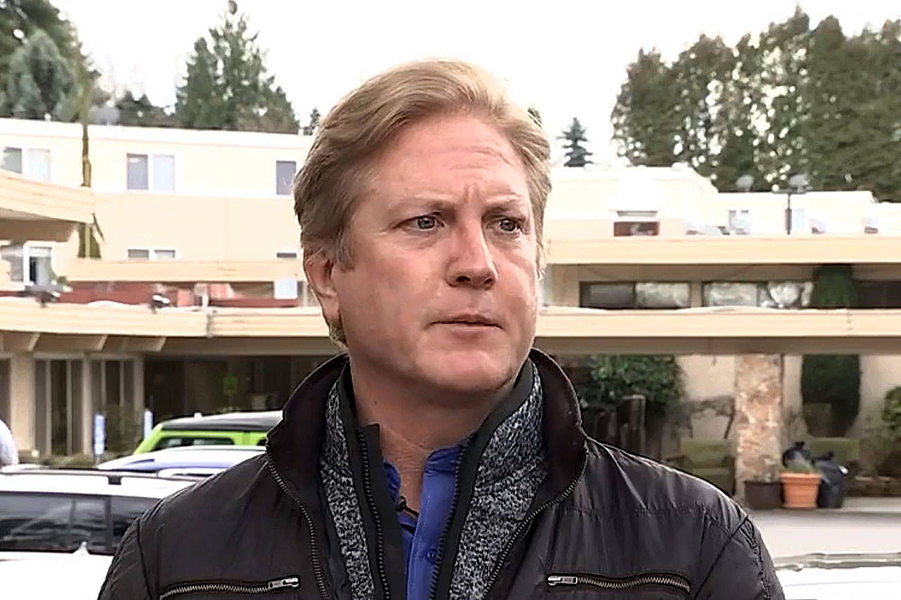 Public information liaison Tim Killian at a March 12 press briefing in front of the Life Care Center of Kirkland. Livestream screenshot