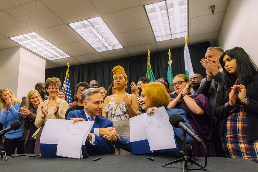 The Regional Homelessness Authority was created by agreement in December 2019. Pictured: King County Executive Dow Constantine shakes hands with Seattle Mayor Jenny Durkan. Courtesy photo