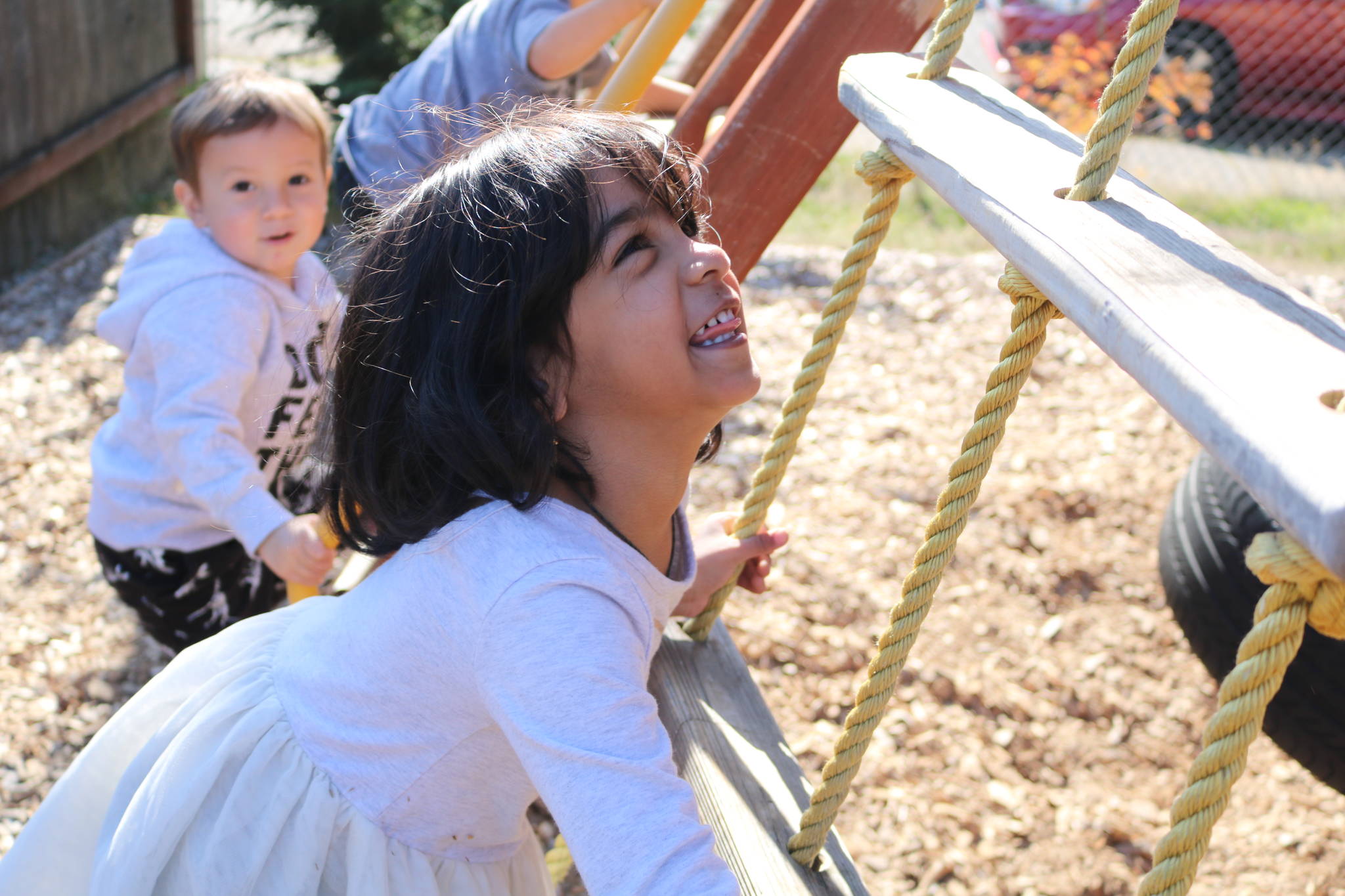 Listen and Talk students playing on playground. Courtesy photo.