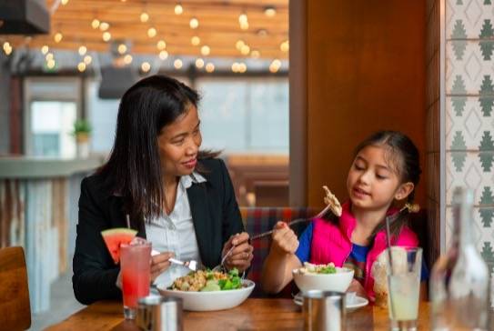 Co-owner Yuie Wiborg and her daughter, Kyla. Soi Kirkland offers kids under 14 a free bowl of egg or rice noodles with steamed chicken. Courtesy photo/Suzi Pratt for Soi Restaurant