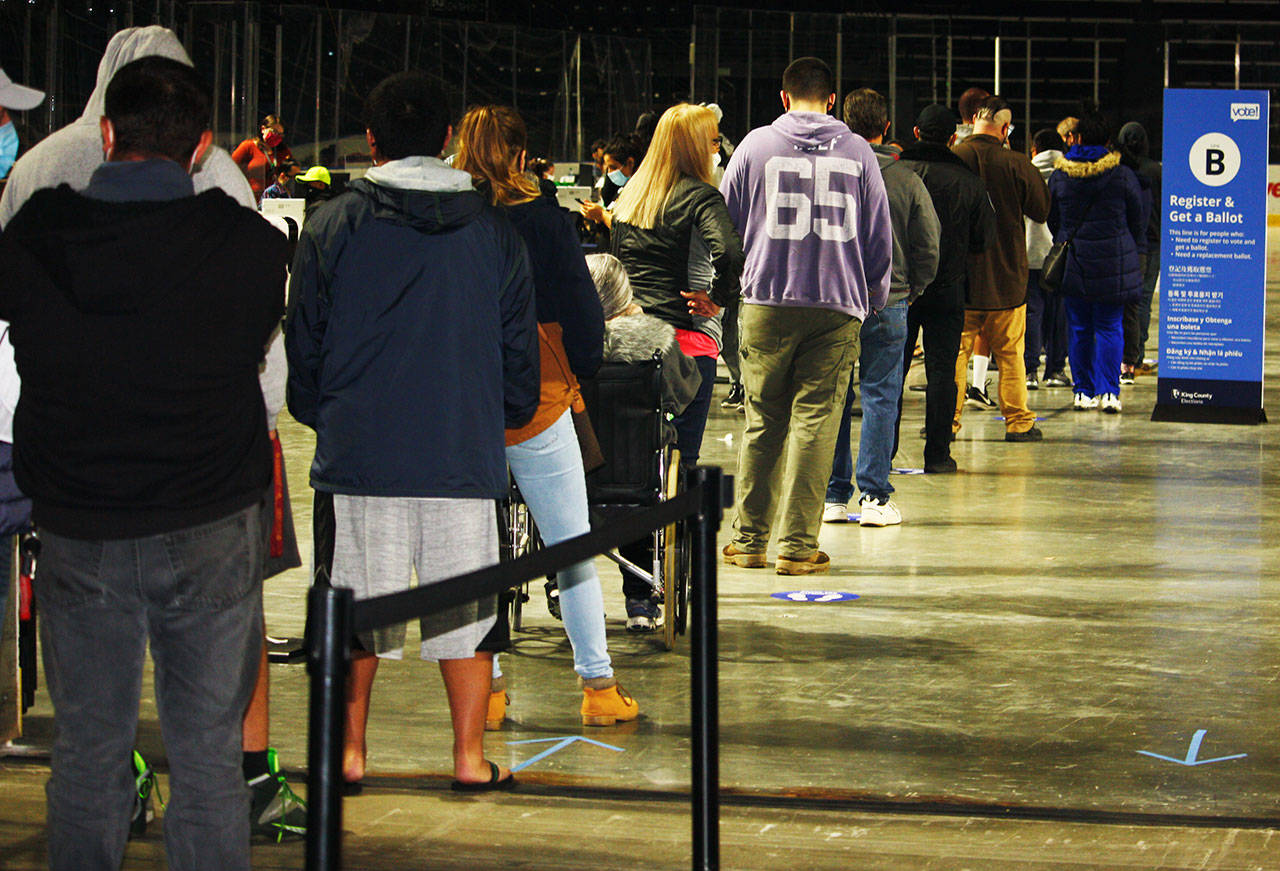 People line up to vote Nov. 3 at the King County Vote Center at the accesso ShoWare Center in Kent. FILE PHOTO, Kent Reporter