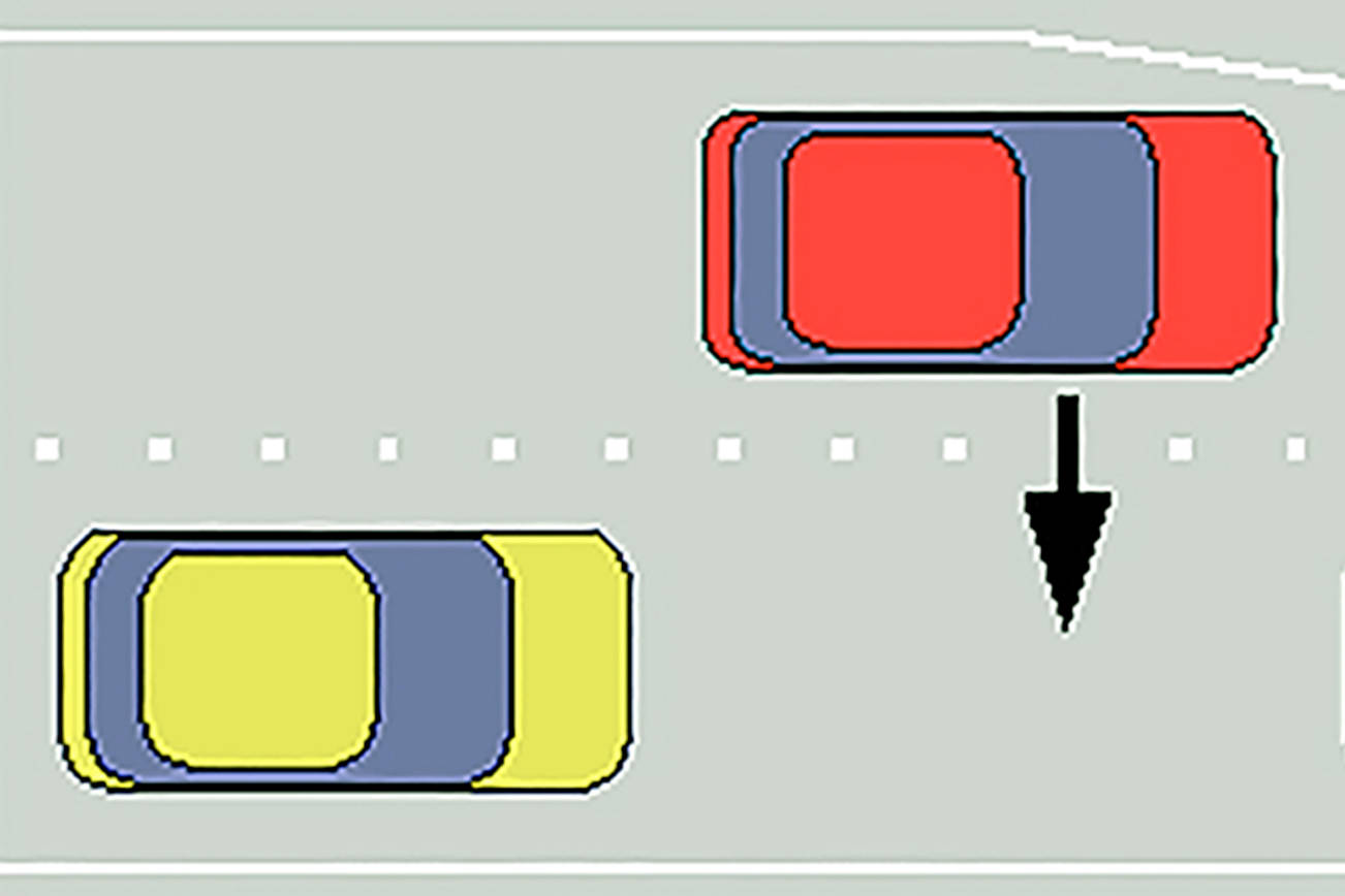 In a zipper merge, cars continue in their lanes and then take turns at the point where the lanes meet. (Koenb via Wikimedia Commons)