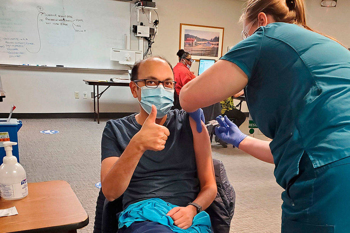 Dr. Amit Desai of St. Francis Hospital in Federal Way receives a COVID-19 vaccine on Dec. 17, 2020. COURTESY PHOTO, CHI Franciscan