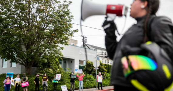 Abortion rights protesters fill all four corners of the intersection in front of the Everett Planned Parenthood in support of abortion rights on Saturday, July 9, 2022 (Olivia Vanni / Sound Publishing)