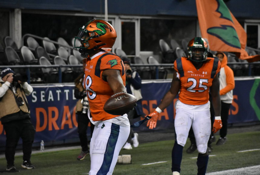 <p>Sea Dragon WR Jordan Veasy celebrates and looks at the home fans after he scored the go ahead touchdown Feb. 23. Photos by Ben Ray/Sound Publishing</p>