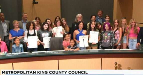 King County Councilmember Claudia Balducci invited young Swifties to read the proclamation, with each taking an album title-themed clause. (Courtesy of King County)