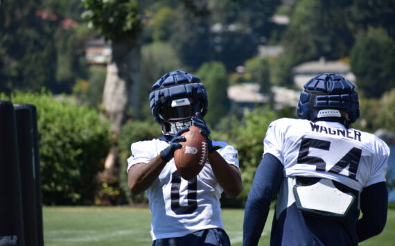 Devin Bush in front, working on his hands with fellow linebacker Bobby Wagner. (Photos by Ben Ray/Sound Publishing)