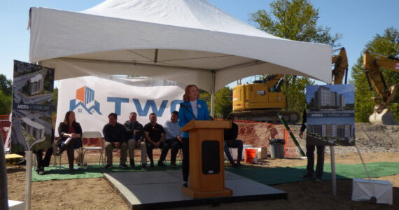 Kirkland Mayor Kelli Curtis at the podium stand. (Cameron Sires/Sound Publishing)