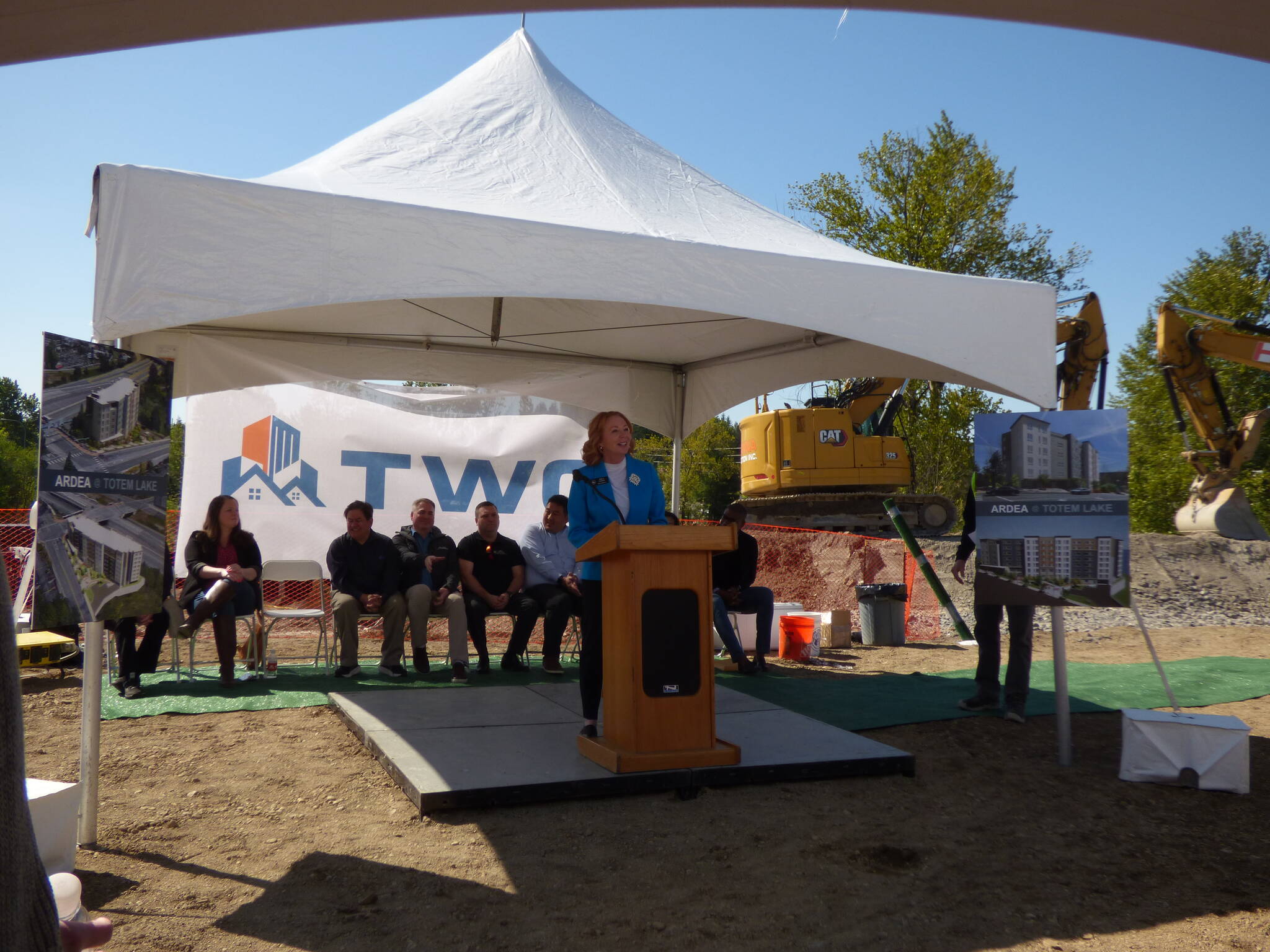 Kirkland Mayor Kelli Curtis at the podium stand. (Cameron Sires/Sound Publishing)