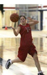 Juanita junior Kimberly Babaworks out with the team during practice.