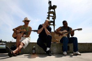 Musicians entertain the crowds during a sunny day at Marina Park in Kirkland on Friday. From left: Andy Zimmerman