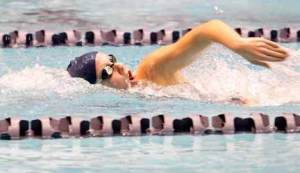 Juanita High School senior Kelly Tannhauser won the 500-freestyle during the state swim meet Saturday at the King County Aquatic Center in Federal Way.