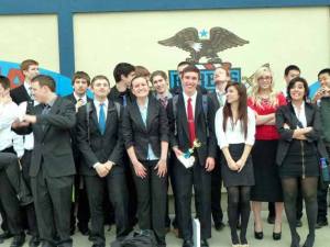 Juanita High School DECA students recently competed in the Area 3 DECA competition against 878 other students for the right to compete at the state level. Evan Ellefsen (center