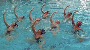 A Seattle Synchro team swims in the Juanita High School pool. The city of Kirkland and Wave Aquatics are actively planning to build another pool before the Juanita pool closes in 2017.