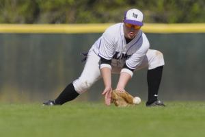 Kangs 2B Spencer Jackson (2) fields a ground ball and throws to first for an out during a KingCo 3A playoff against Sammamish at Bannerwood Park in Bellevue on Thursday