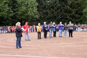Kirkland National Little League President Kristin Adams introduces FanFest's special guests.