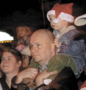 Top left: Hundreds gather at Marina Park’s lift station to celebrate Kirkland’s Annual Holiday Tree Lighting event on Saturday