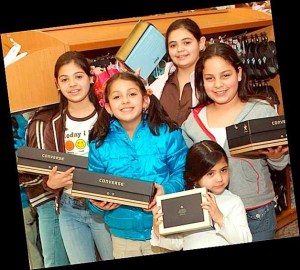 Several members of the Rotary Club of Kirkland recently provided assistance while local elementary students selected a new pair of shoes for the school year at the Totem Lake Fred Meyers.