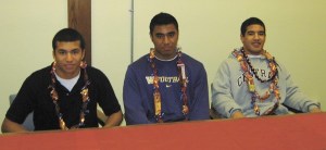 Three students from Juanita High School signed letters of intent this morning to play college football. They include