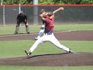 JD Worcester delivers a pitch against Mercer Island during Juanita’s 3A KingCo tournament matchup with the Islanders Saturday at Bannerwood Park in Bellevue. The Islanders beat the Rebels 10-0 (Joe Livarchik/Mercer Island Reporter)