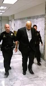 Burrell Michael Cushman is escorted into King County Superior Court on Tuesday. Aaron Kunkler/Kirkland Reporter