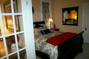 The Loomis House Bed and Breakfast suite includes a sitting area and bedroom that are divided by French doors. This is the city’s only bed and breakfast.