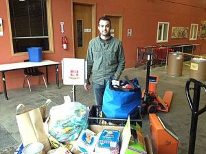 Andrew Montero of Guild Mortgage delivering food to Hopelink’s Kirkland/Northshore food bank.