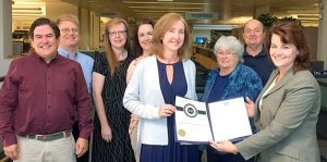 Pictured left to right: City Council Member Jay Arnold; Michael Olson