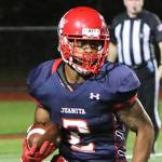 Juanita&rsquo;s Salvon Ahmed outruns a Mercer Island defender earlier this season. Ahmed rushed for 13 touchdowns and more than 1,200 yards, earning the 3A KingCo offensive MVP award. JOE BYRNE/Courtesy photo