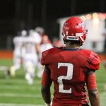 Juanita High running back Salvon Ahmed watches in disbelief as Southridge celebrates a 35-29 victory in the district playoffs on Nov. 5 at Bergh Field in Kirkland. JOE BYRNE/Submitted photo
