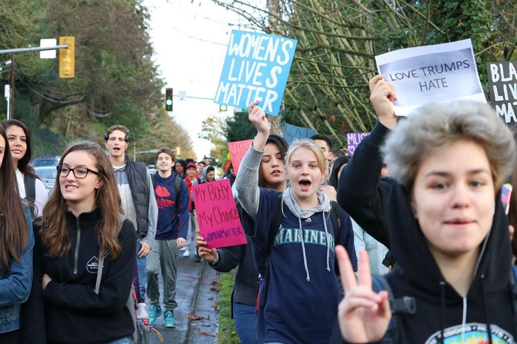Juanita High School students walk down 132nd Street as part of a protest on Nov. 14. JOHN WILLIAM HOWARD/Kirkland Reporter