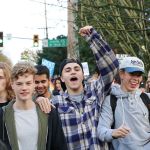 Juanita High School students walk down 132nd Street as part of a protest on Nov. 14. JOHN WILLIAM HOWARD/Kirkland Reporter