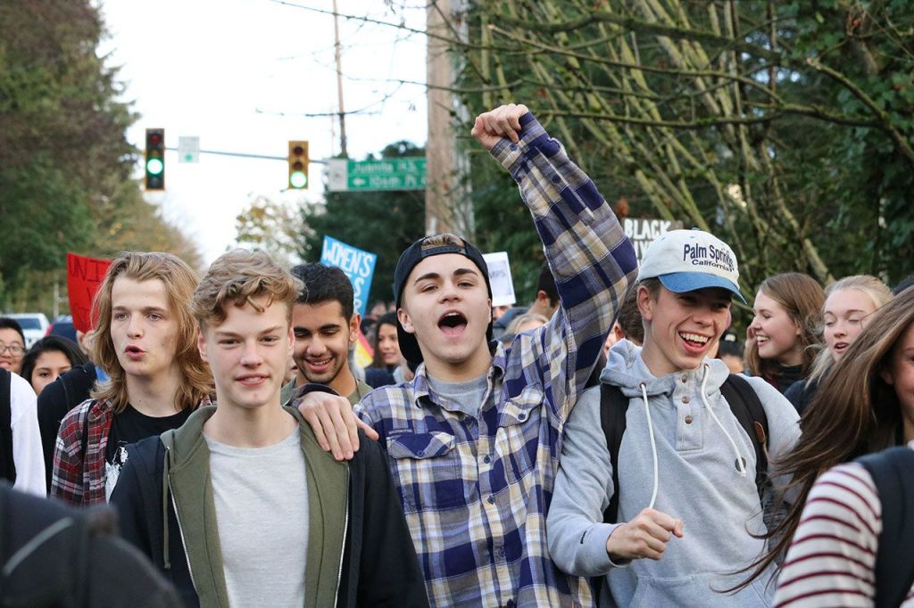 Juanita High School students walk down 132nd Street as part of a protest on Nov. 14. JOHN WILLIAM HOWARD/Kirkland Reporter
