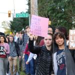 Juanita High School students walk down 132nd Street as part of a protest on Nov. 14. JOHN WILLIAM HOWARD/Kirkland Reporter