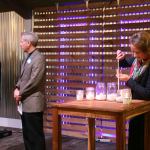 Salt House Pastor Sara Wolbrecht (right) lights candles as other faith leaders read prayers to bless the New Bethlehem Day Center. CATHERINE KRUMMEY/Kirkland Reporter